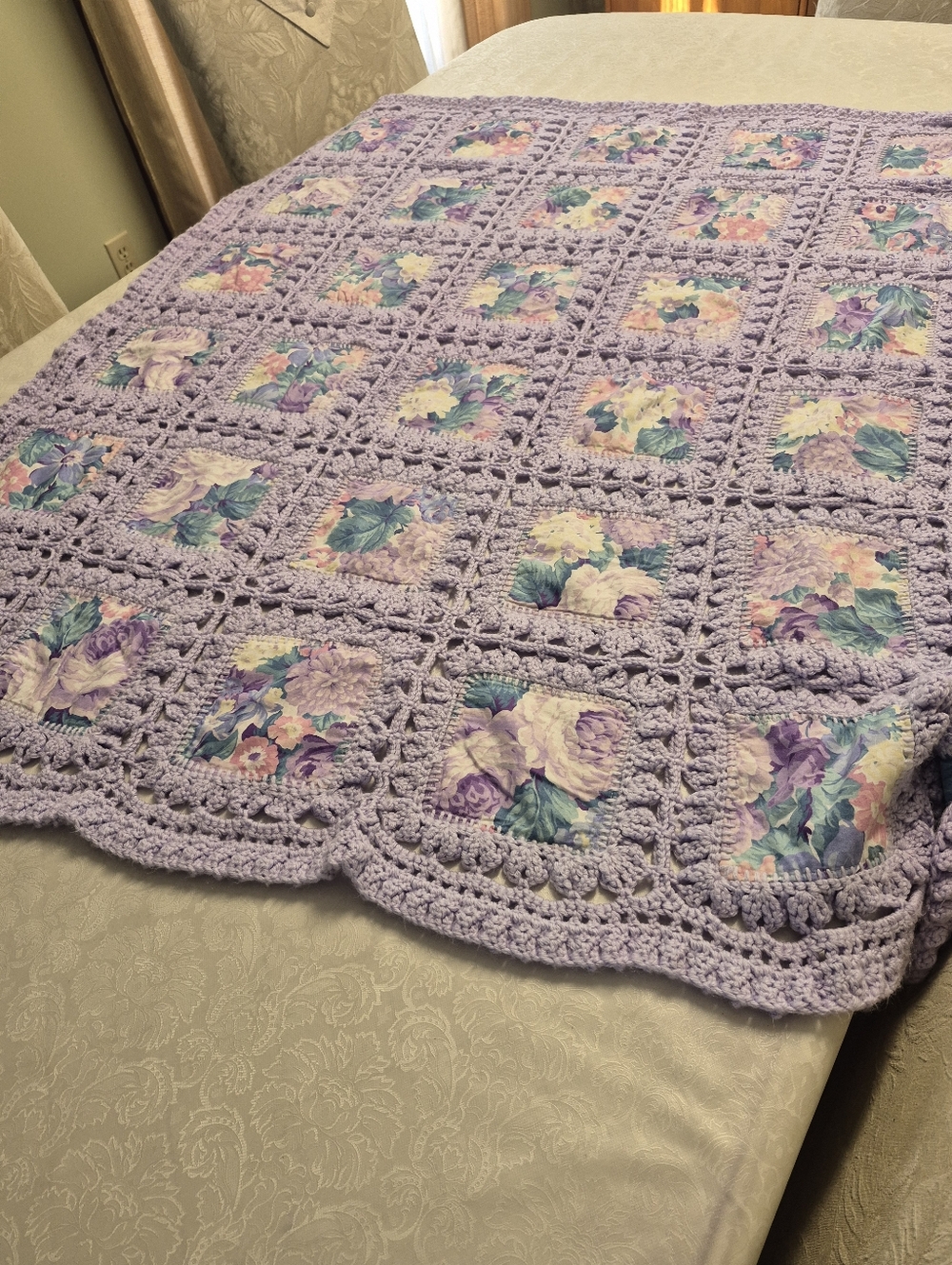 lavender floral blanket is a handmade crochet Granny Square.
